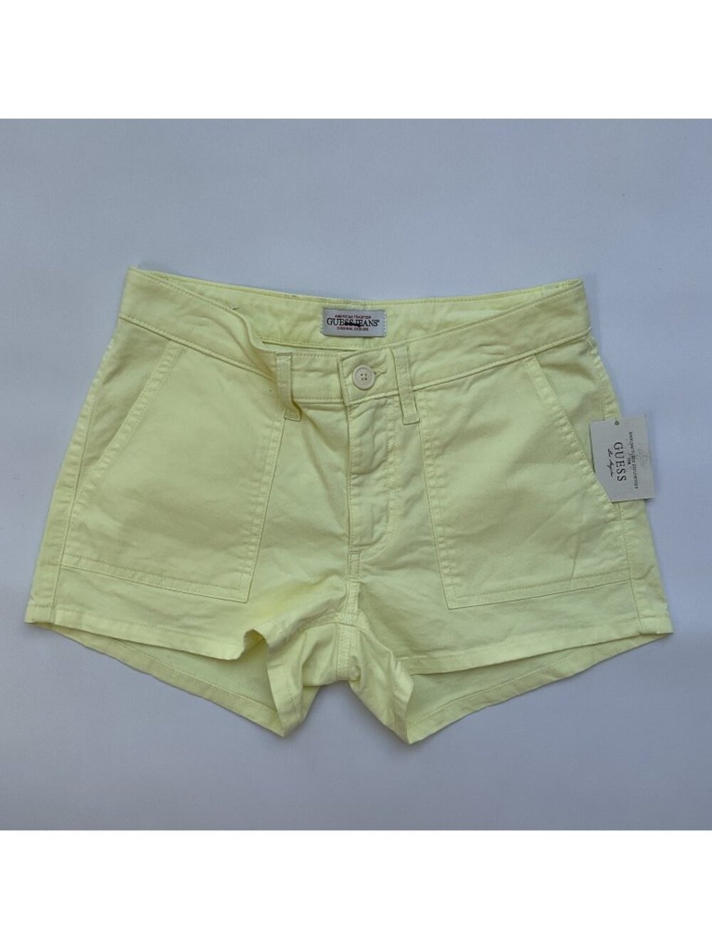 Guess Women’s Mid Rise Short In Light Yellow Big Front Pockets Size 27